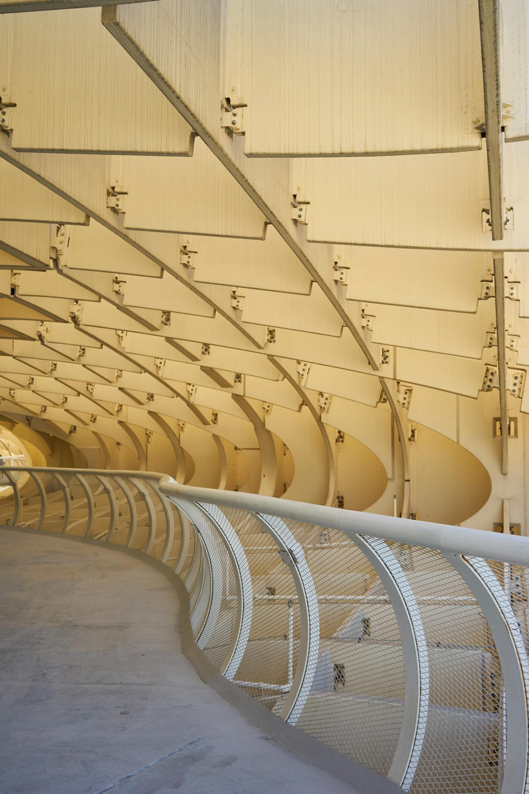 Intricate wooden structure forming a walkway at Metropol Parasol in Seville.